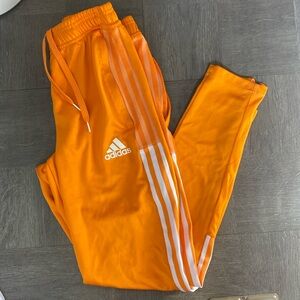 Orange adidas joggers